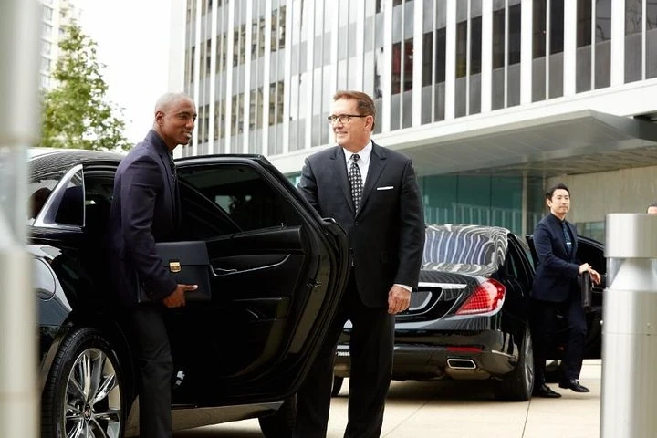Professional chauffeur service with luxury limousine for Orangeville Airport transportation, ensuring comfort and punctuality.